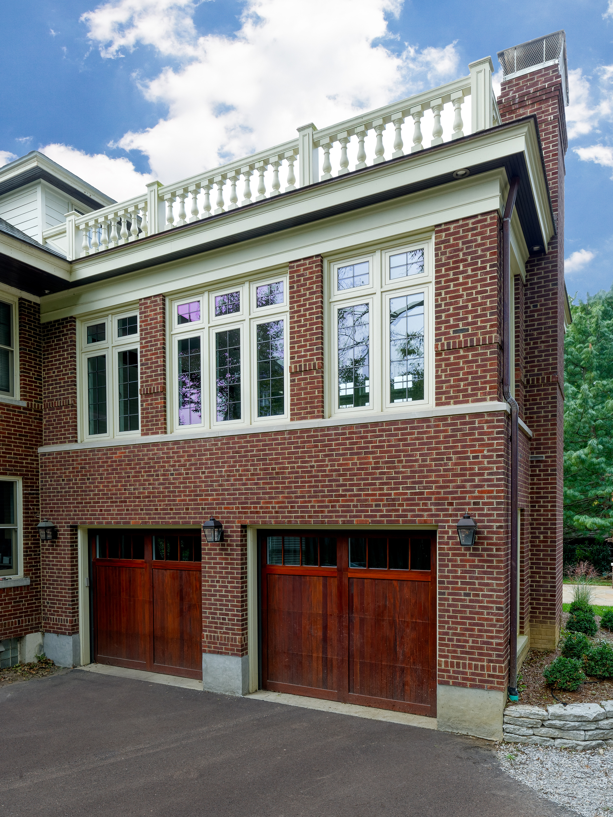 brick garage with second-story family room addition above