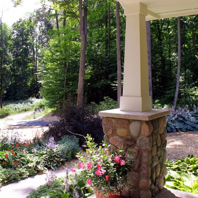 View from front porch with stone pier and wood column