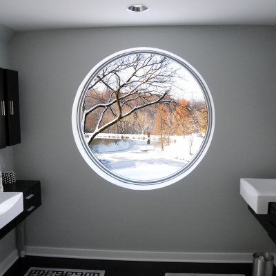 Main bathroom picture window view of pond and trees 