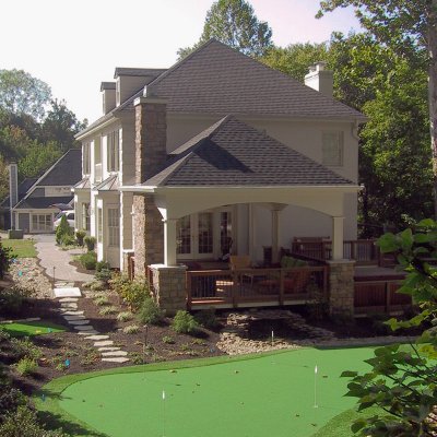 Putting green and covered outdoor living room residential