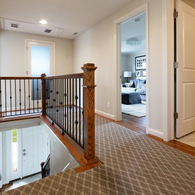 upstairs hall railing with iron details Wilcox Architecture Mt. Lookout