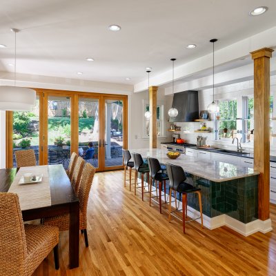 Dining and kitchen area with doors to an outside patio