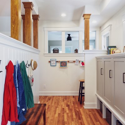 Coats on hooks and storage cabinets Wilcox Architecture