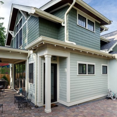 Kitchen and 2nd-floor main suite addition exterior view 