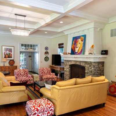 terrace park residential addition with stone fireplace and coffered ceiling