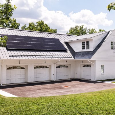 Garage exterior with solar panels on roof
