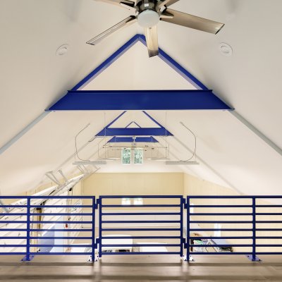 Interior Garage loft with blue roof trusses