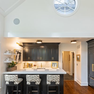 addition wet bar vaulted ceiling great room round window