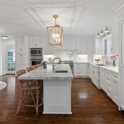 kitchen white cabinets gold light fixture island barstools