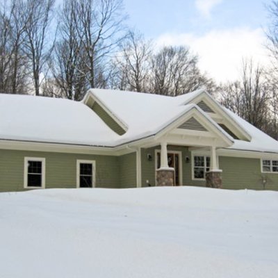 Glen Arbor new home with snow   