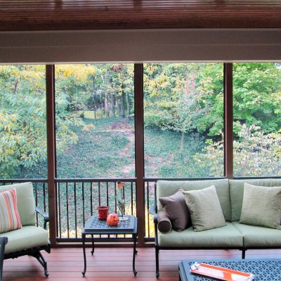 Furnished screened porch with fall colors