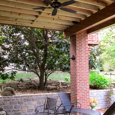 Covered porch area underneath screened porch